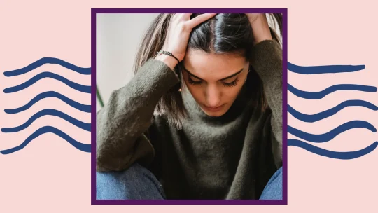 a woman with her head down