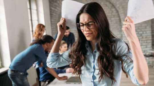 woman frustrated with coworkers