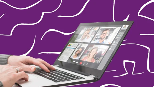 a laptop showing people in a meeting