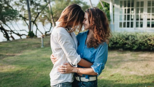 Couple standing outside