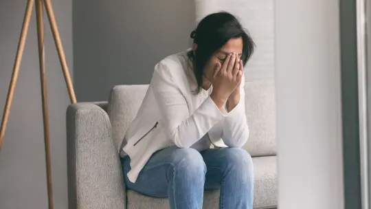 Sad woman at home