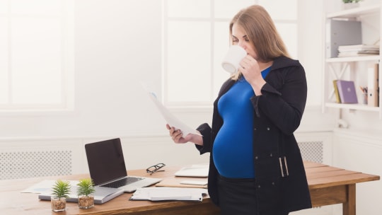 Pregnant woman working