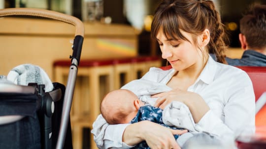 Woman Breastfeeding in Public