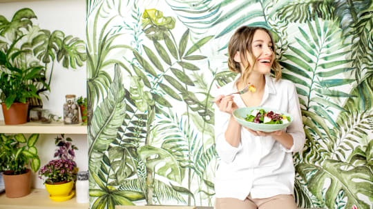 Woman eating salad