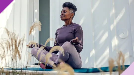 woman outside meditating