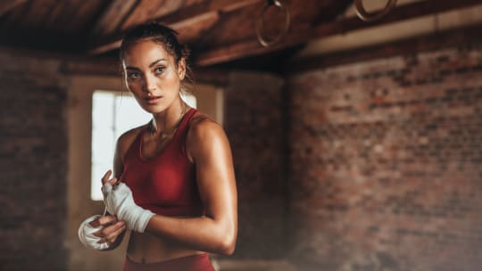Woman kickboxing