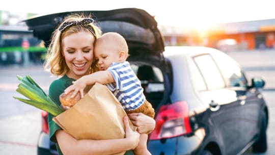 mother shopping with baby