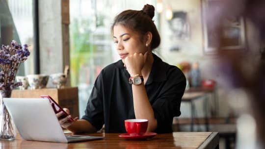Woman working at coffee shop