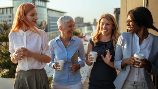 Women at work talking