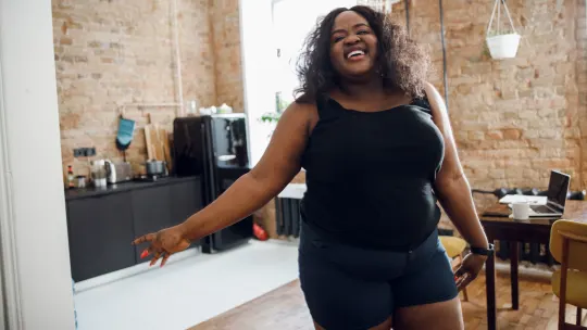 Happy woman dancing