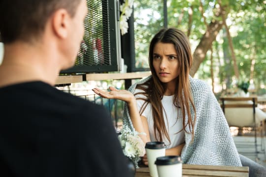 Woman and man talking