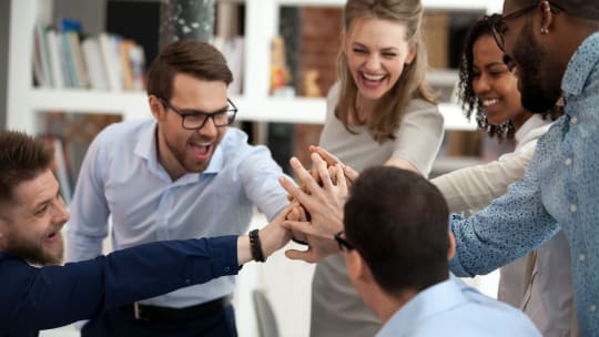 team high-fiving
