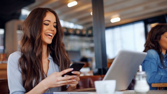 Woman texting at work