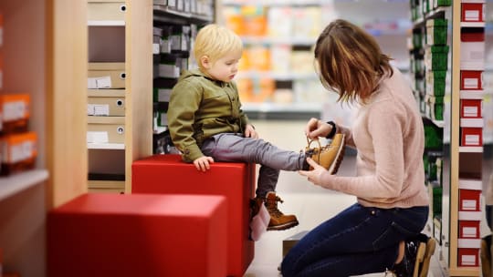 Mom shopping with son