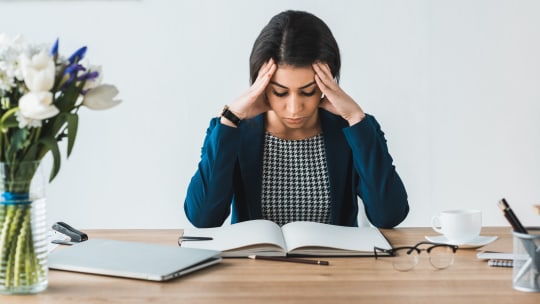 Woman stressed at work