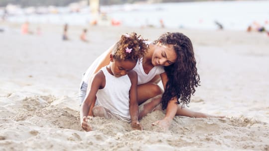 Mother and daughter on beach