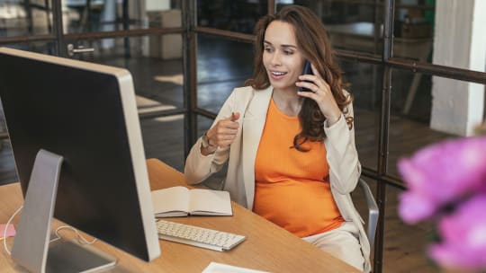 A pregnant woman at work