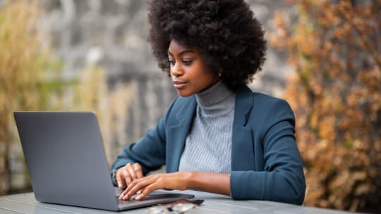 Woman working on a laptop