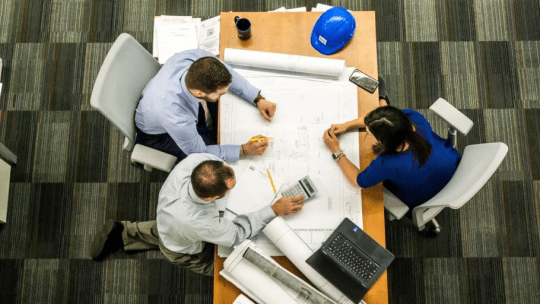 Civil engineers sitting around a table