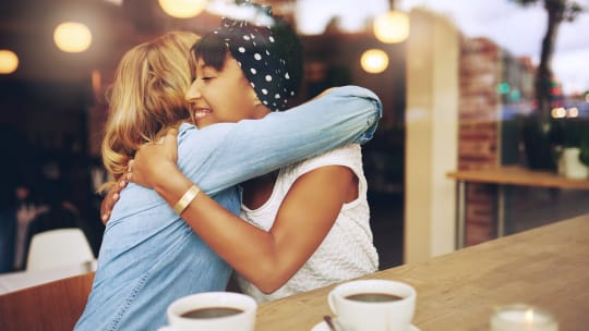 Women hugging