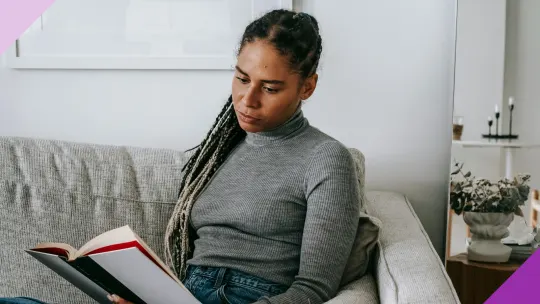 Woman reading a personal finance book