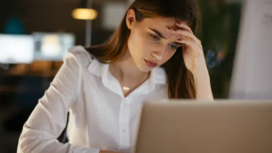 Three people at work