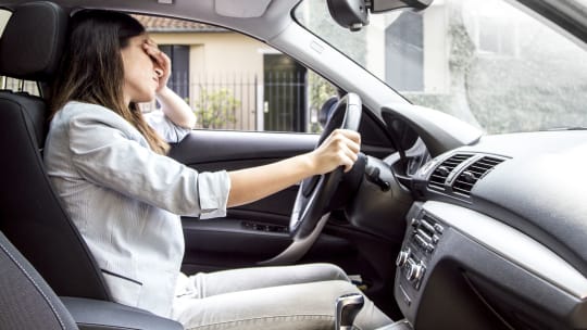 Woman stressed in car