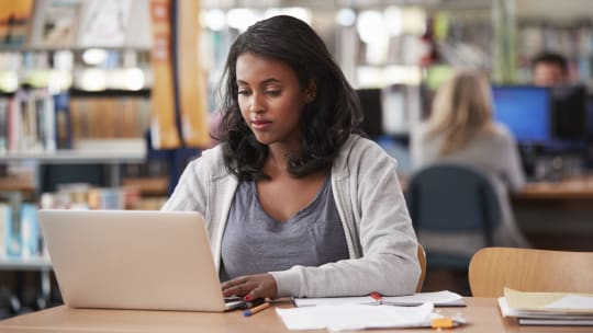 Woman studying in college