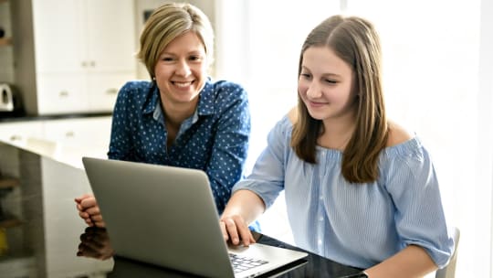 Woman watching daughter apply to college