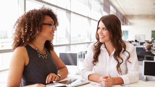 manager and employee talking
