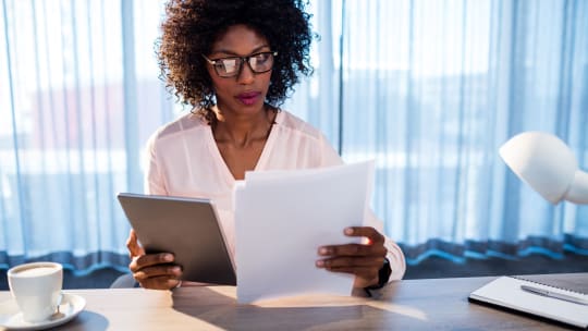 employee reading pay stub