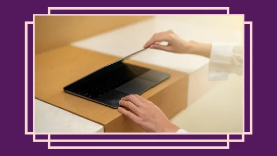 person closing computer