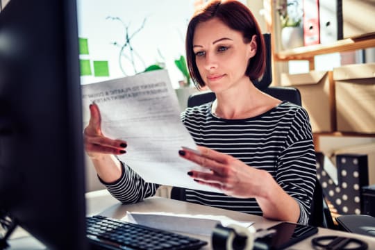 woman reading union contract