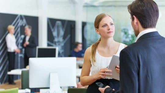 woman confronting man at work