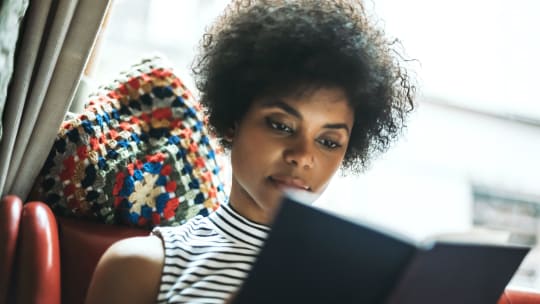 Woman reading book 