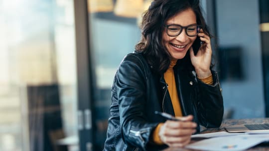 Happy woman on the phone