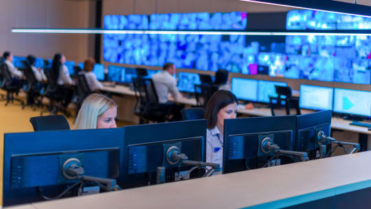 security workers at a security center