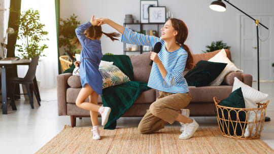 mom and daughter dancing