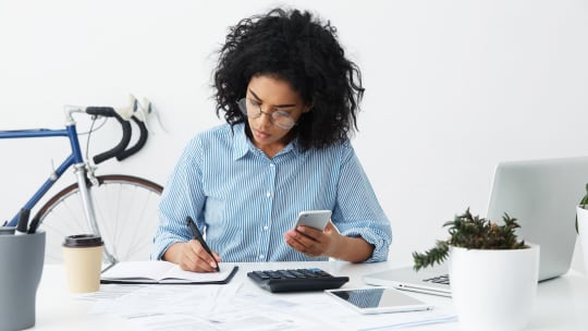 Woman making calculations