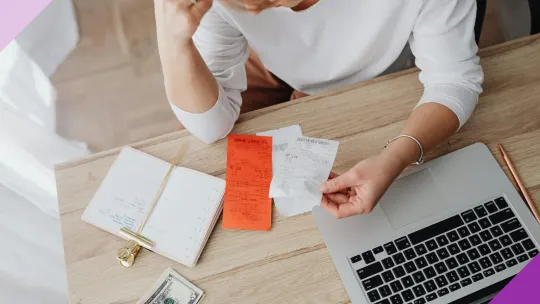 A person managing their finances, illustrating the importance of understanding how to handle an inherited IRA