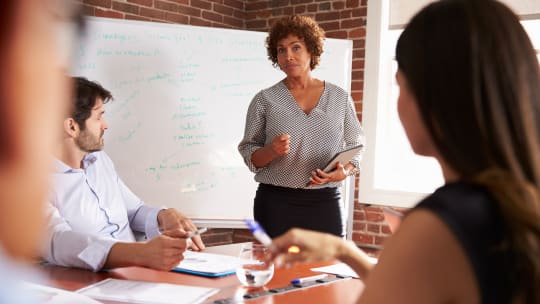 Woman leading meeting