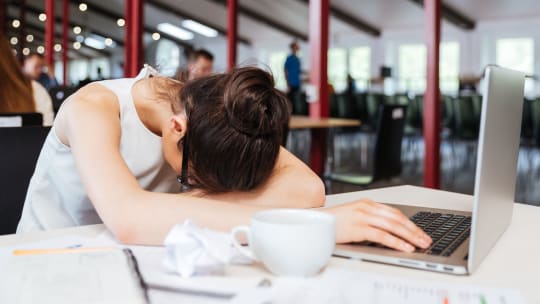Stressed woman at work