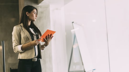Woman looking out window