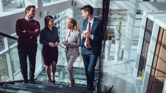 group of business professionals in fancy office