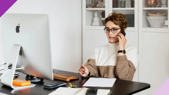 Job seeker on the phone, illustrating how to reschedule an interview