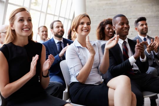 Diverse Audience Applauding