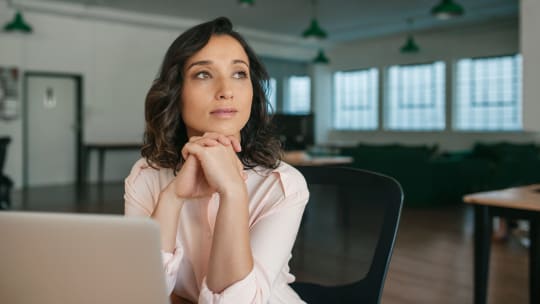 Woman with chronic pain at work