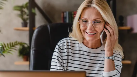 Women talking in office