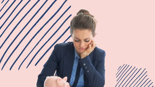 a woman looking sad at work