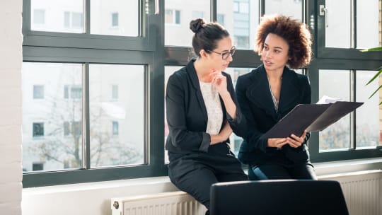 Two women at work 